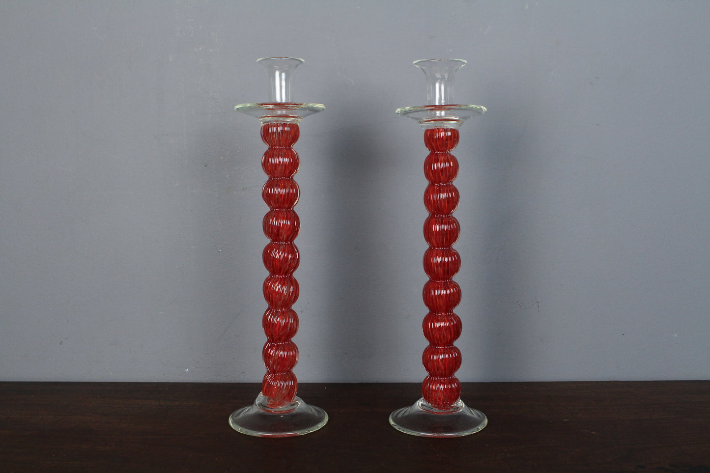 Pair Of Tall Red Glass Candlesticks