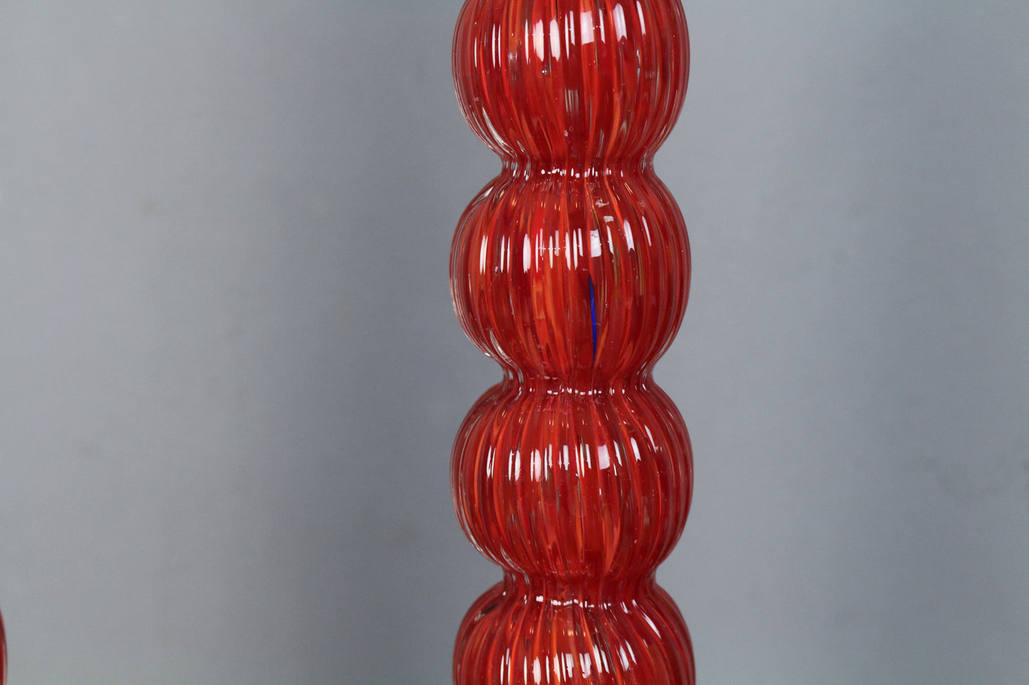 Pair Of Tall Red Glass Candlesticks