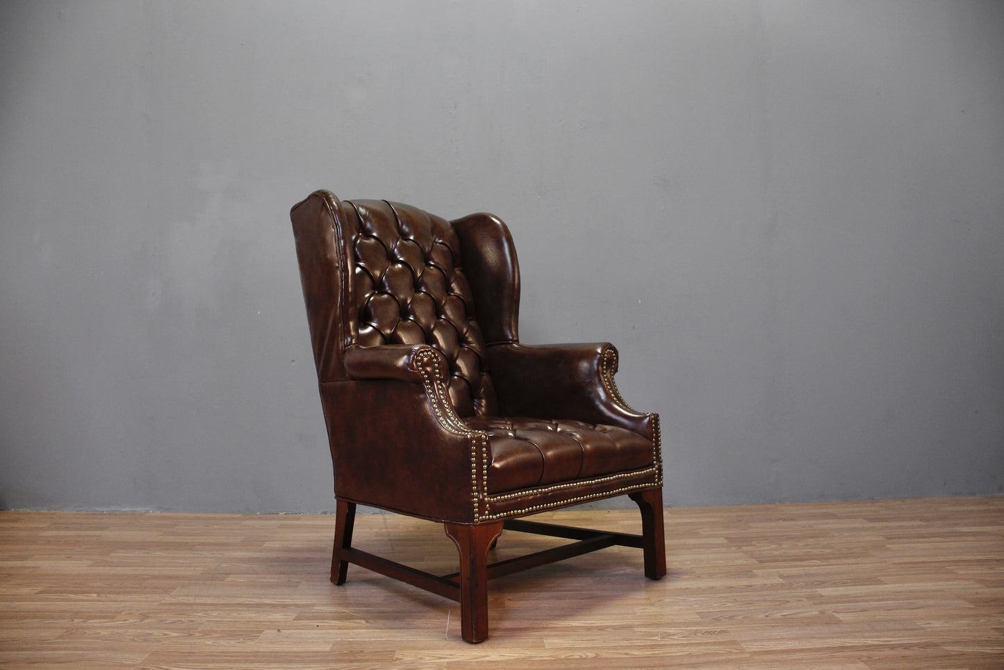 Brown Tufted Wingback Chair