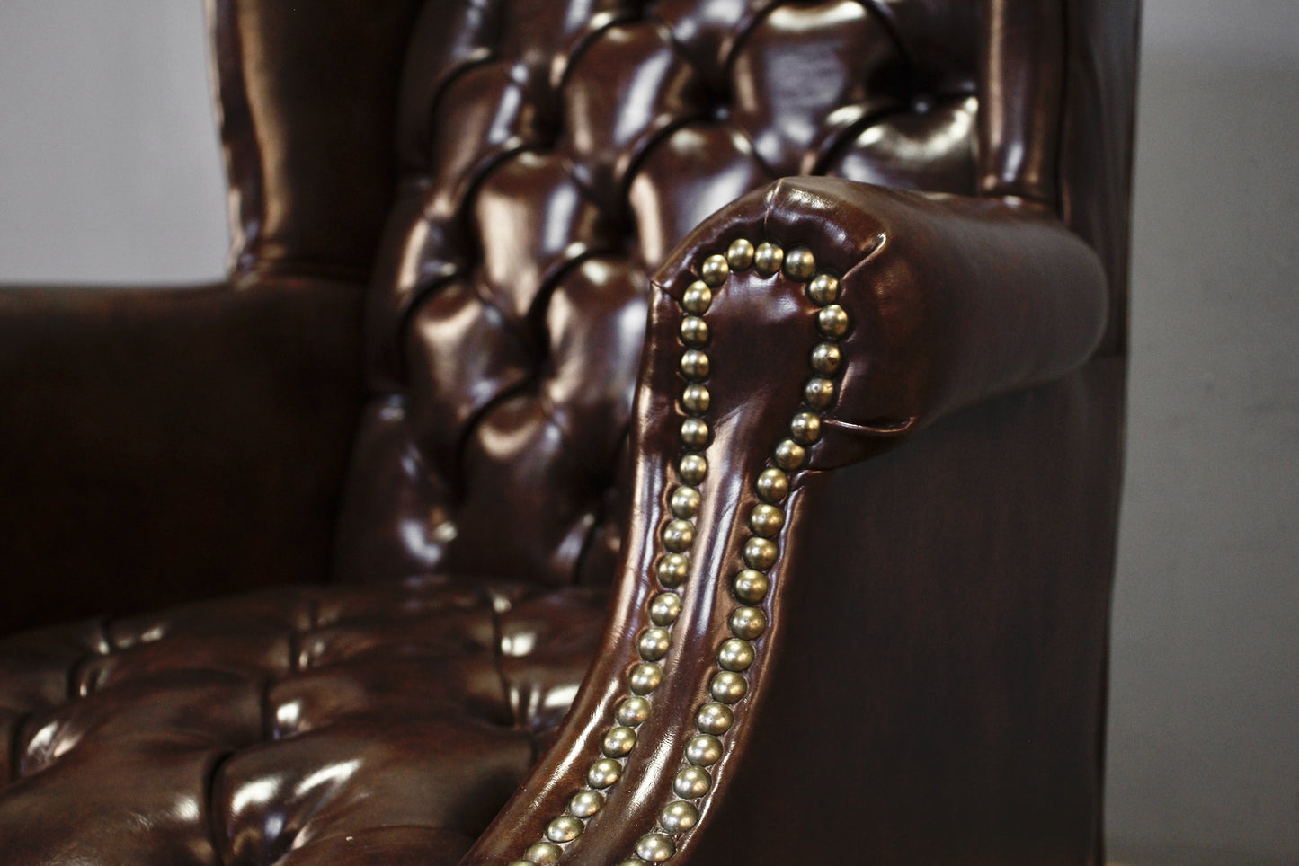 Brown Tufted Wingback Chair