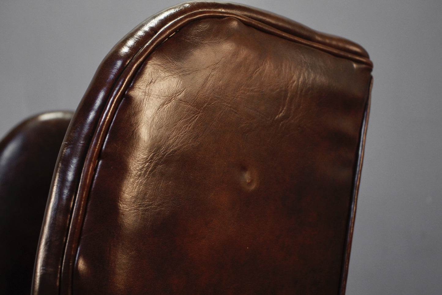 Brown Tufted Wingback Chair