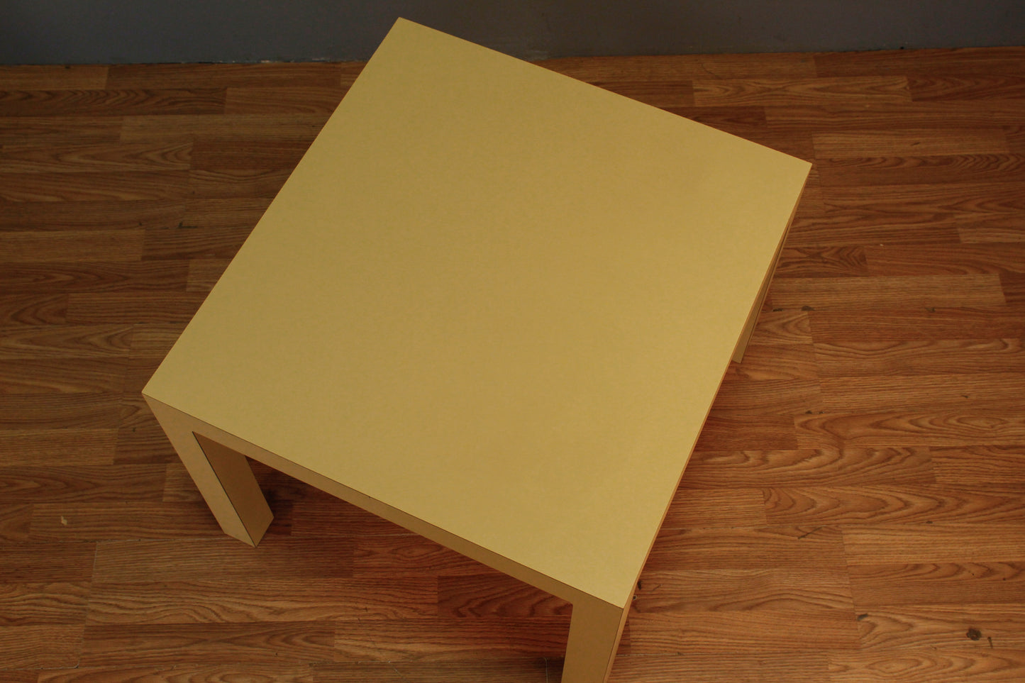 Square Butter Laminate Parsons Table - ONLINE ONLY