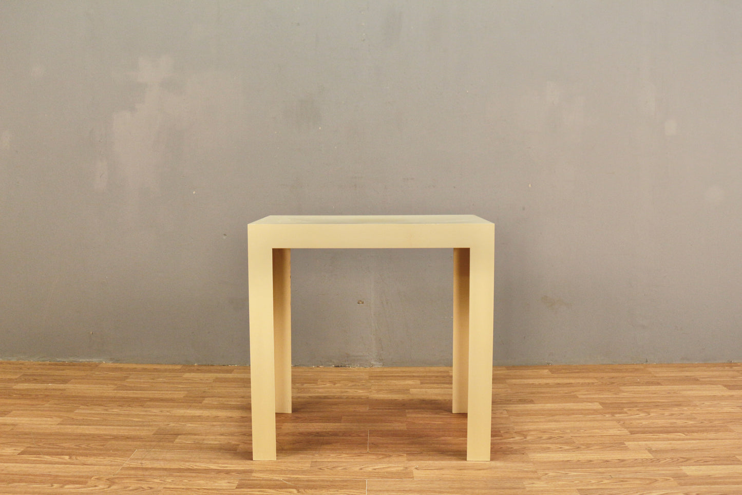 Cream Plastic Parsons-Style Table