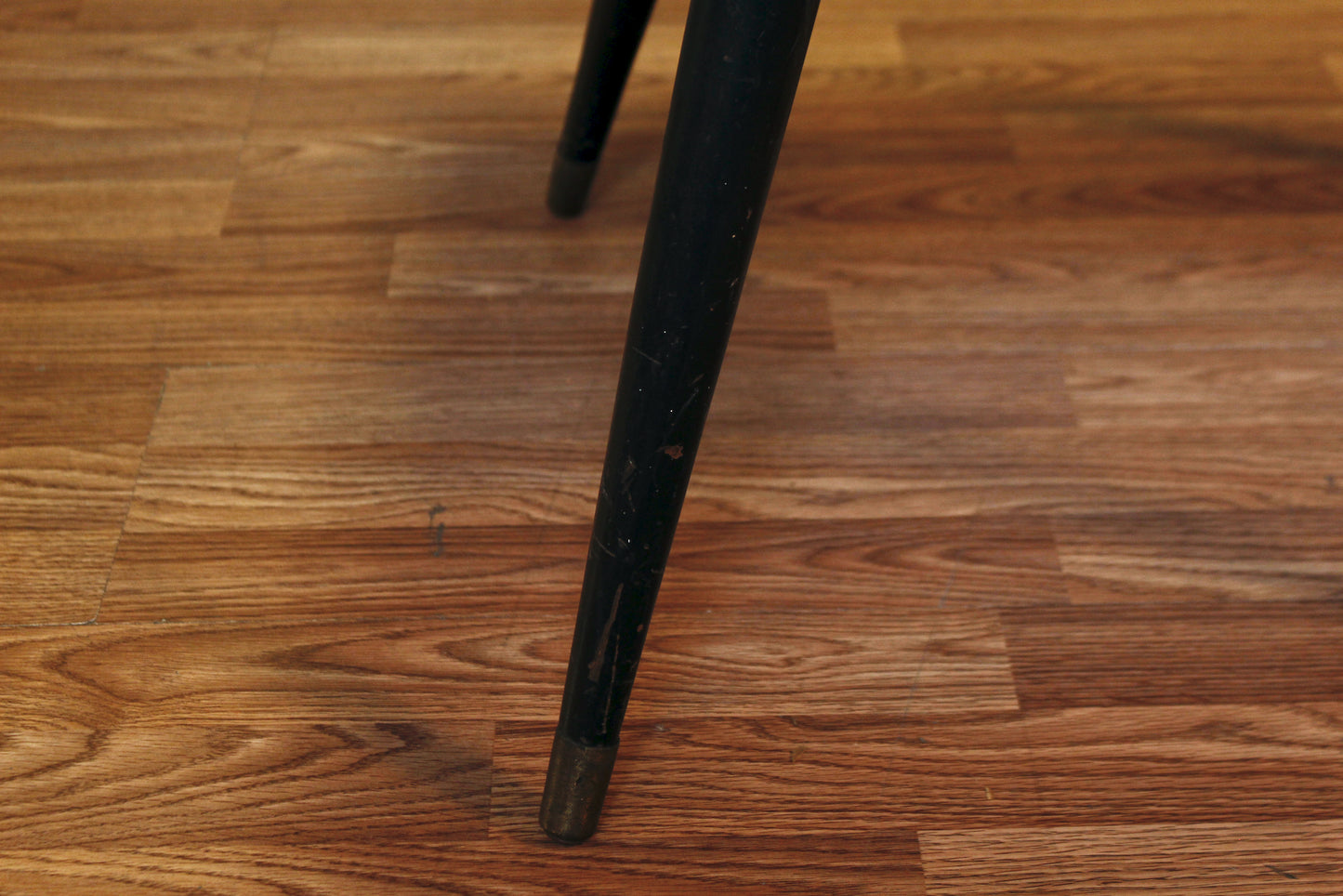 Compact Atomic Black Swivel-Top Coffee Table