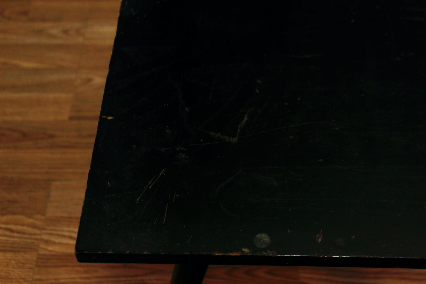 Compact Atomic Black Swivel-Top Coffee Table