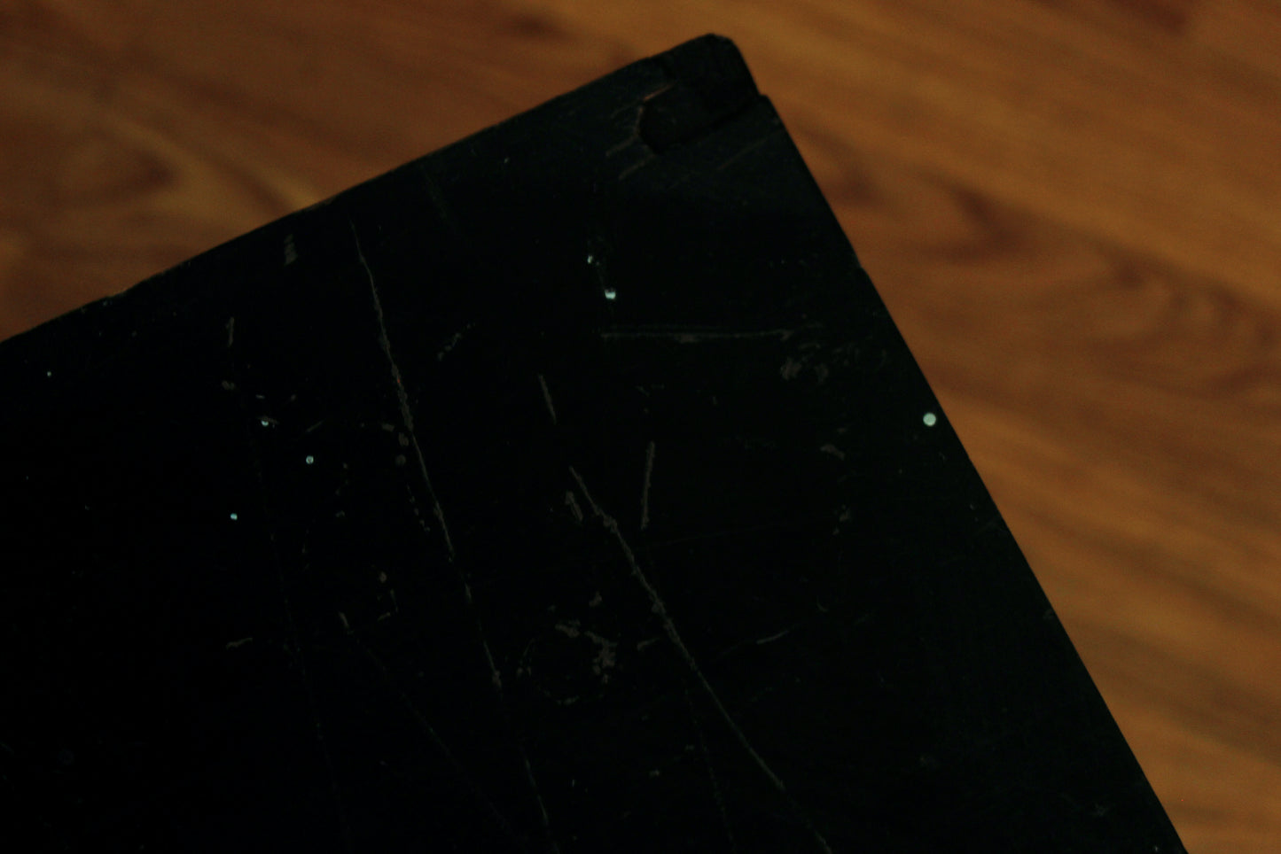 Compact Atomic Black Swivel-Top Coffee Table