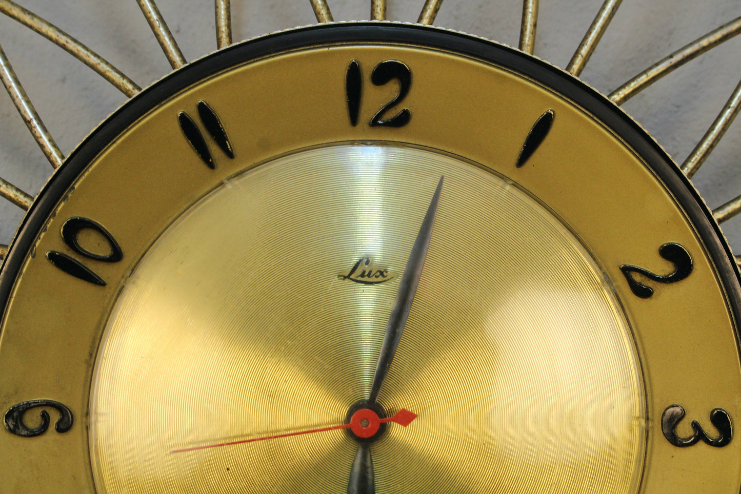 Atomic Gold Burst Wall Clock