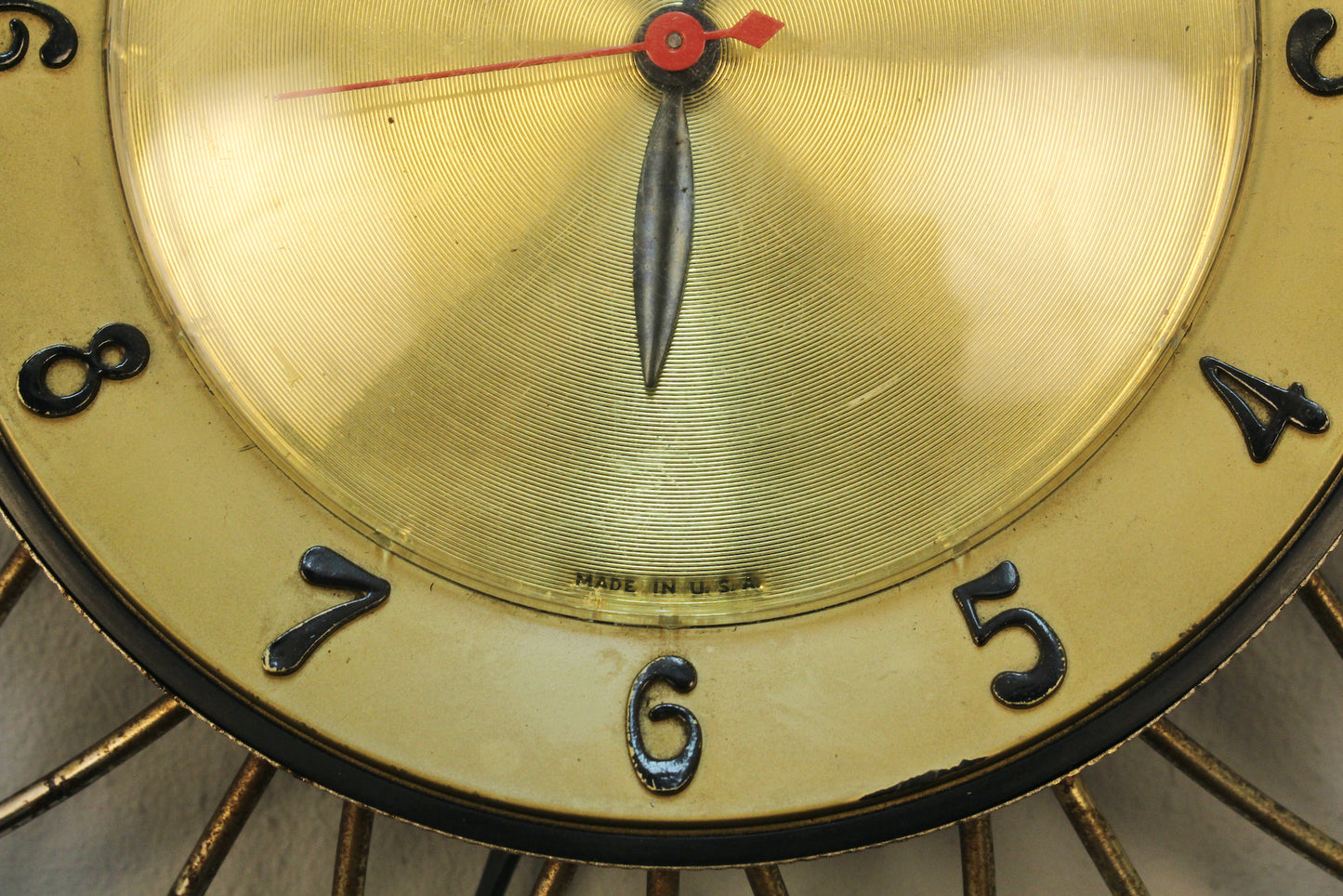 Atomic Gold Burst Wall Clock