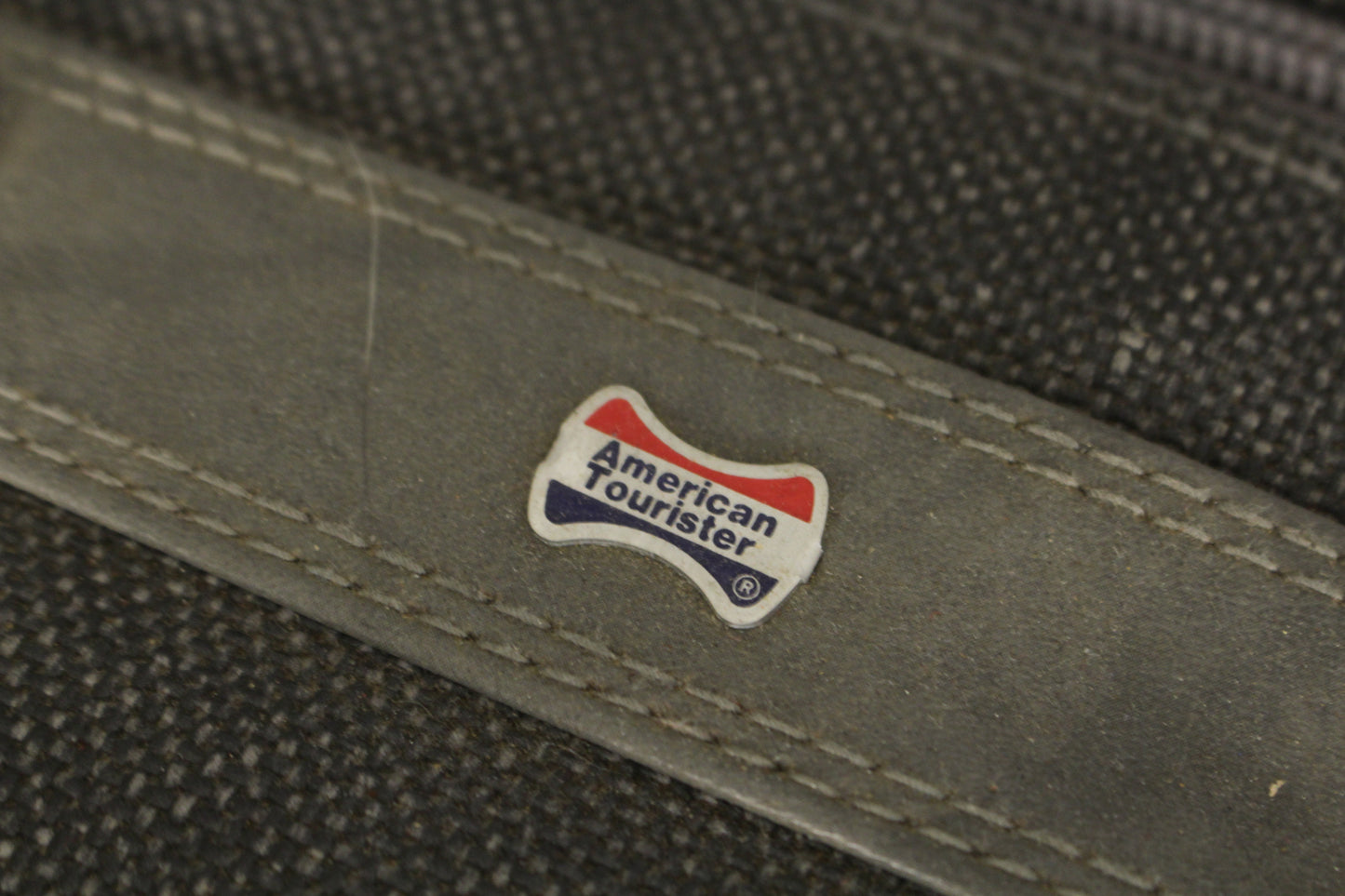 American Tourister Gray Suitcase