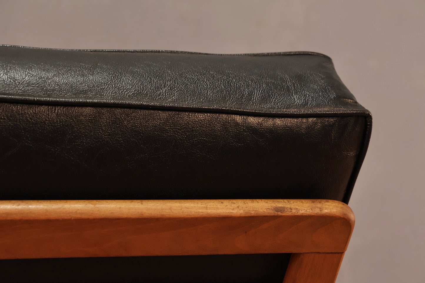 Mid Century Walnut & Black Vinyl Lounge Chair