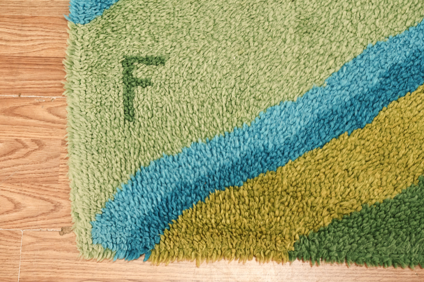 Small Blue-Green "F" Latch Hook Rug