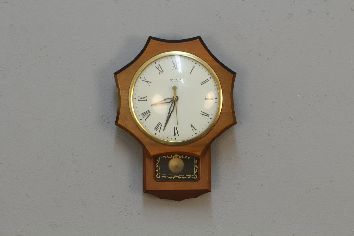 United 1950s Pendulum Wall Clock