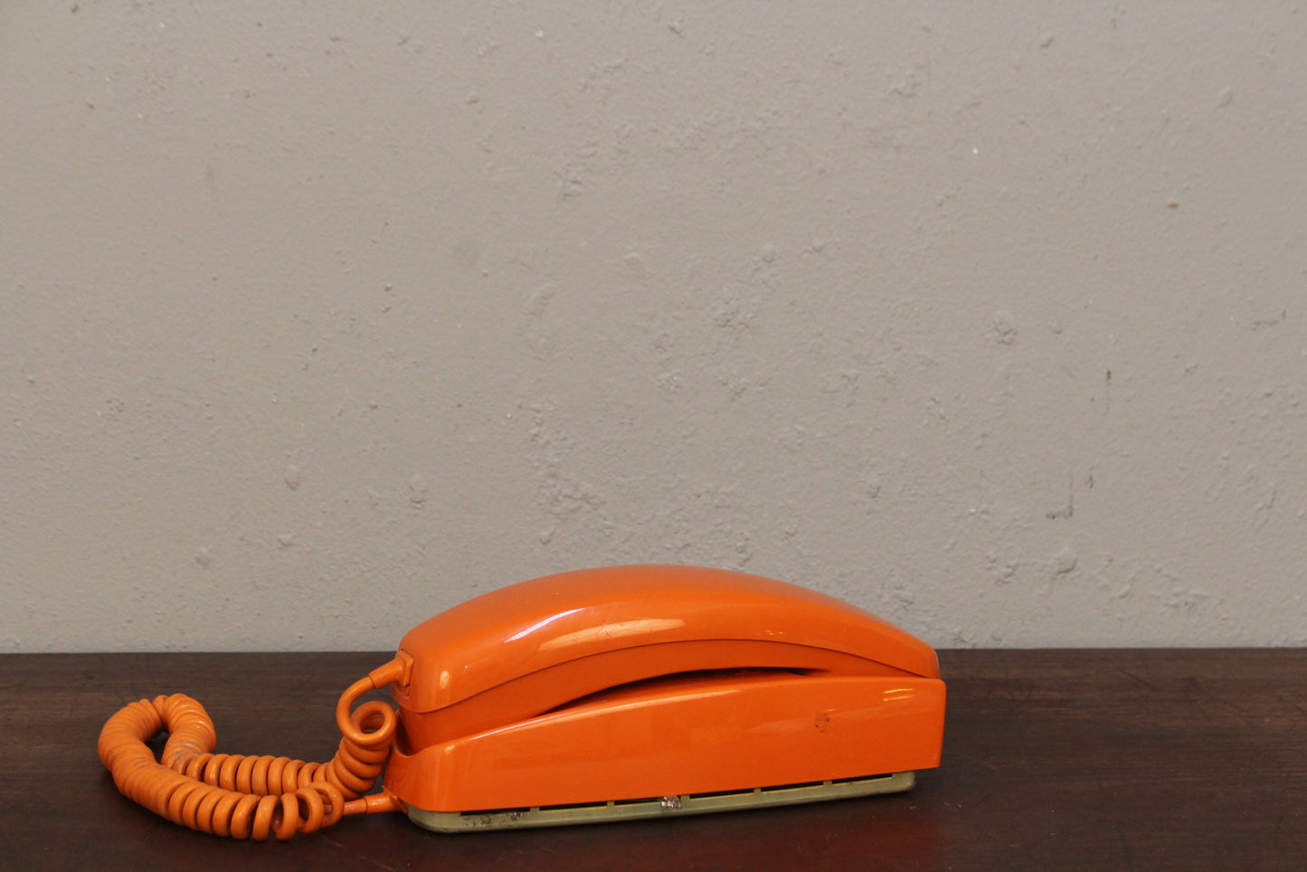 Trimline Orange Rotary Telephone