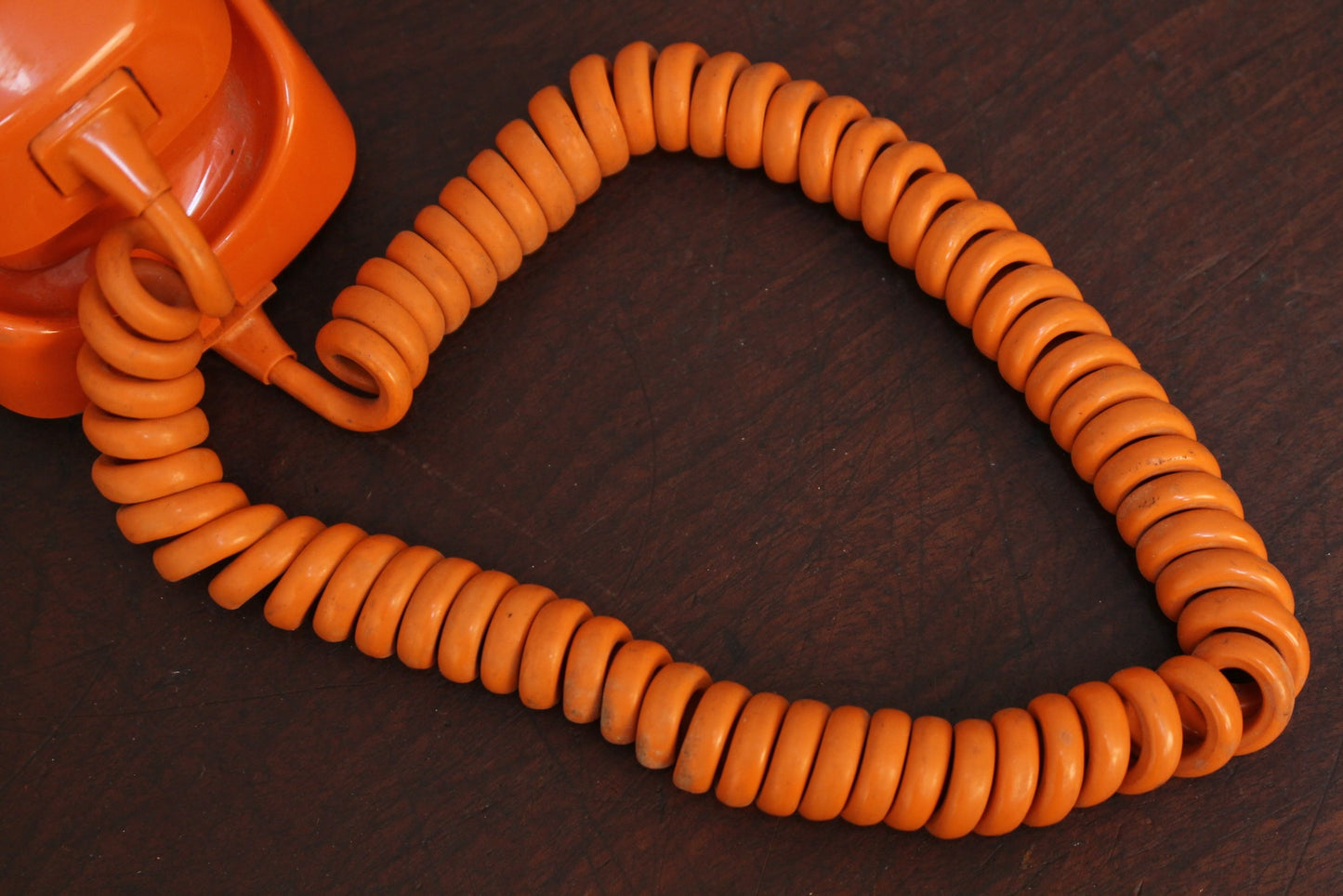 Trimline Orange Rotary Telephone
