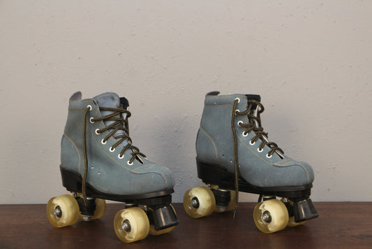 Pair of Blue Suede Roller Skates