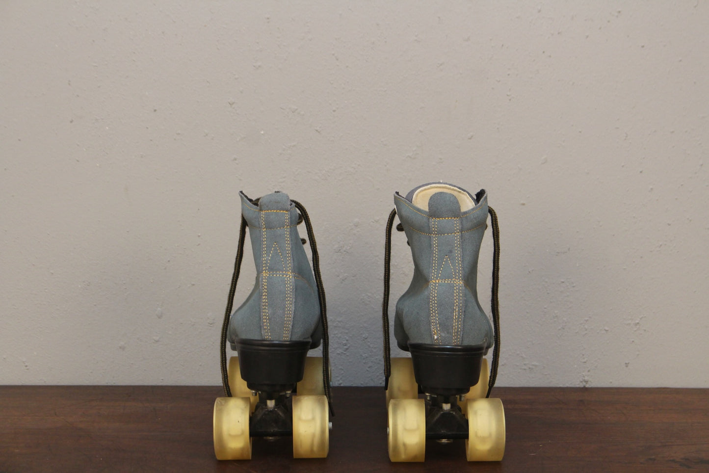 Pair of Blue Suede Roller Skates
