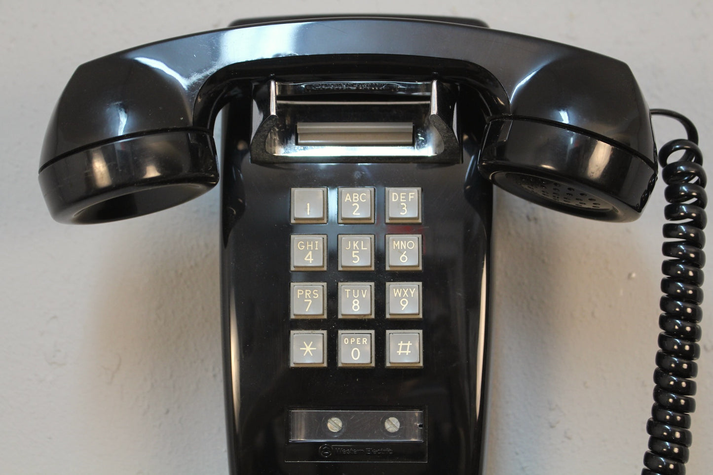 Black Wall-Mount Touch-Tone Telephone
