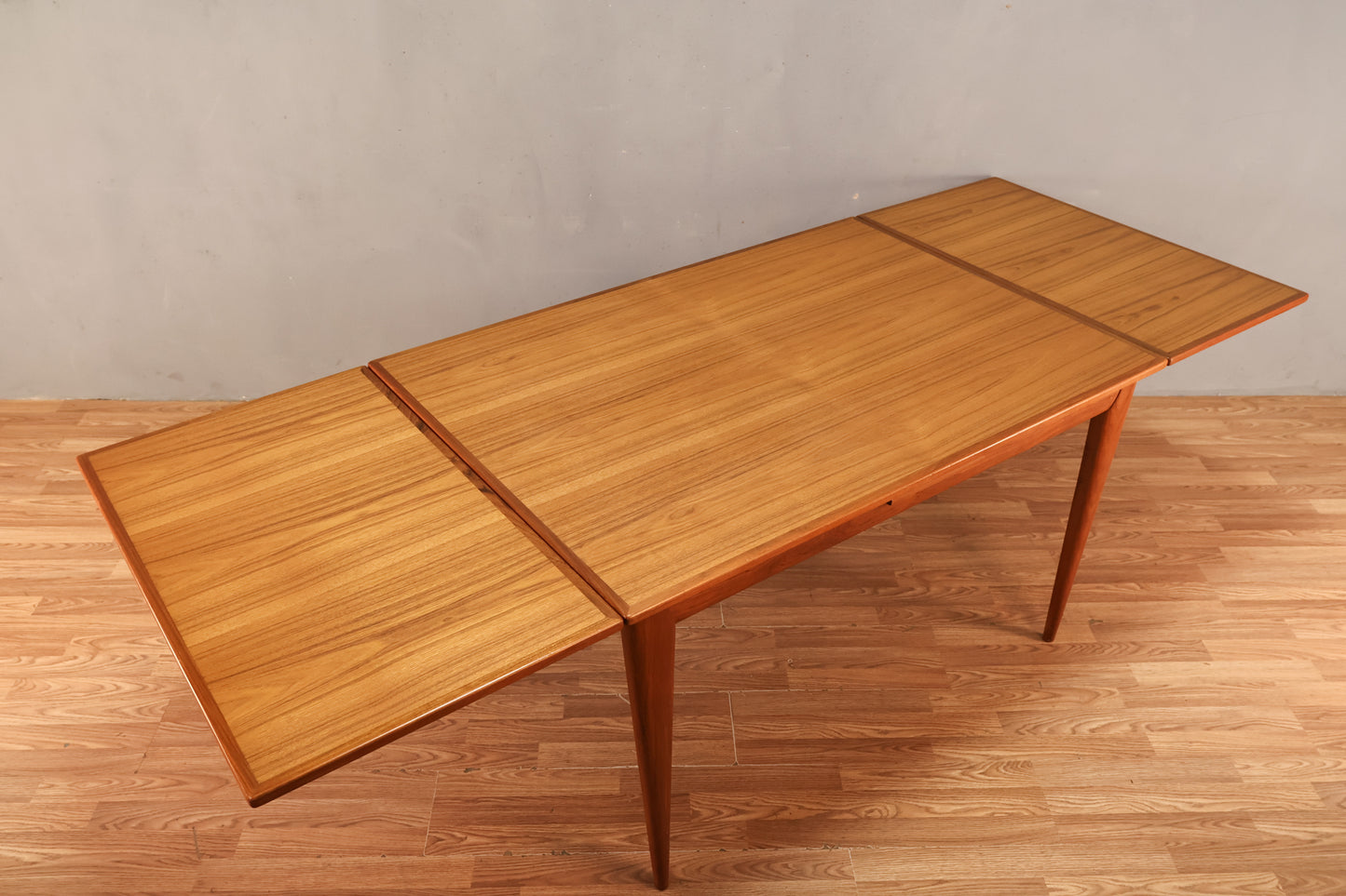 J.L. Møller Teak Dining Table With Built-In Leaves - ONLINE ONLY