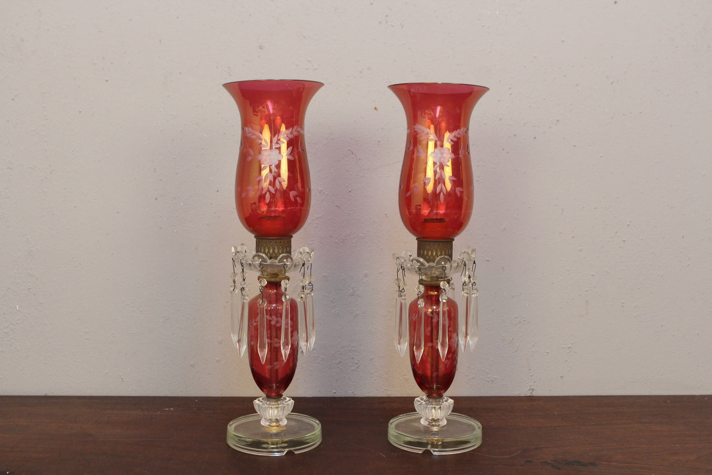 Pair of Cranberry Etched Hurricane Lamps
