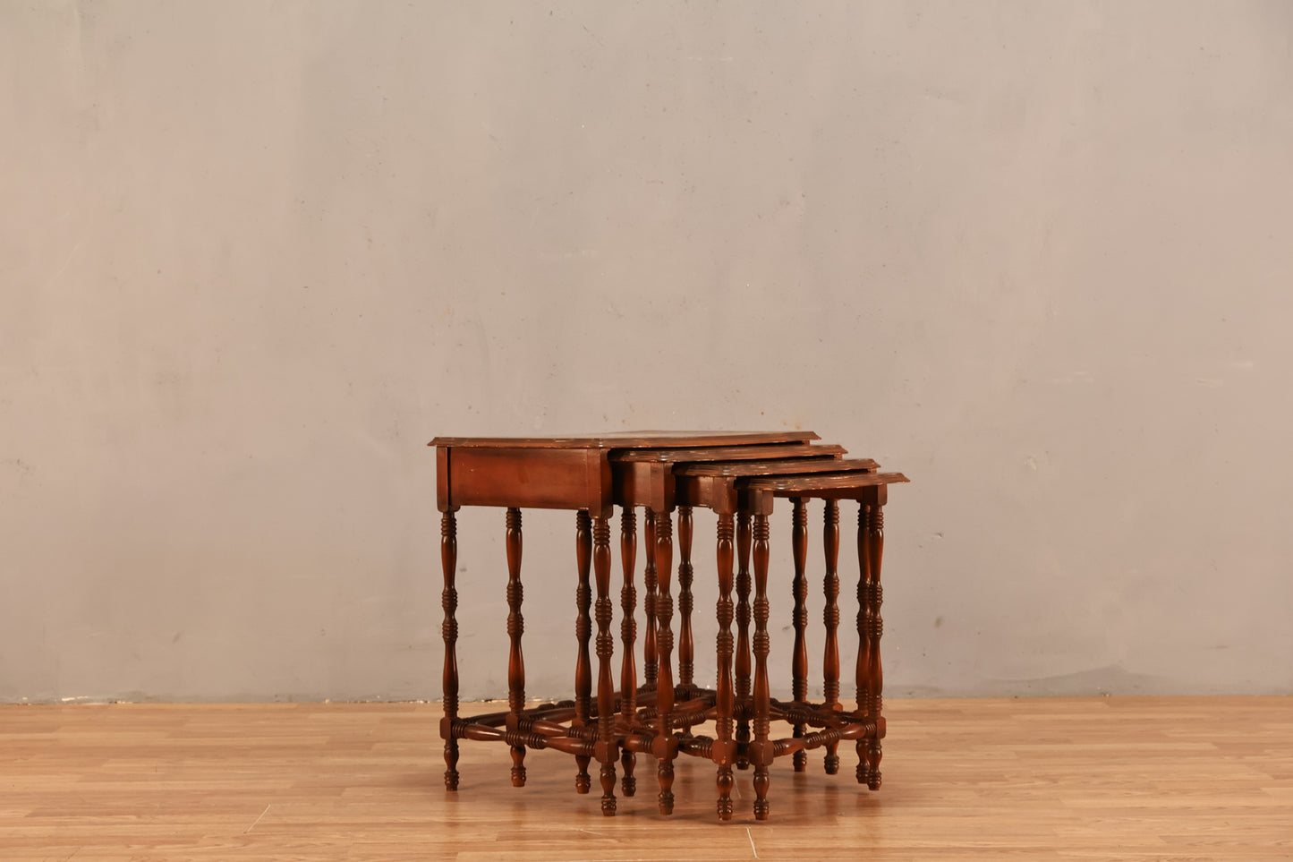 Quartet of Provincial Gold Inlaid Nesting Tables
