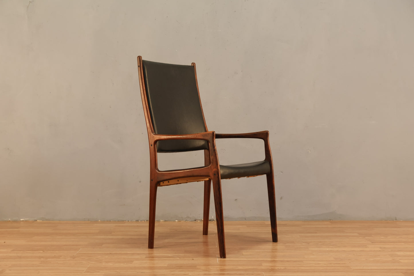 Johannes Andersen Rosewood & Black Leather Armchair