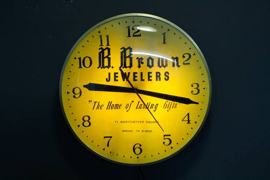 B. Brown Jewelers Illuminated Wall Clock