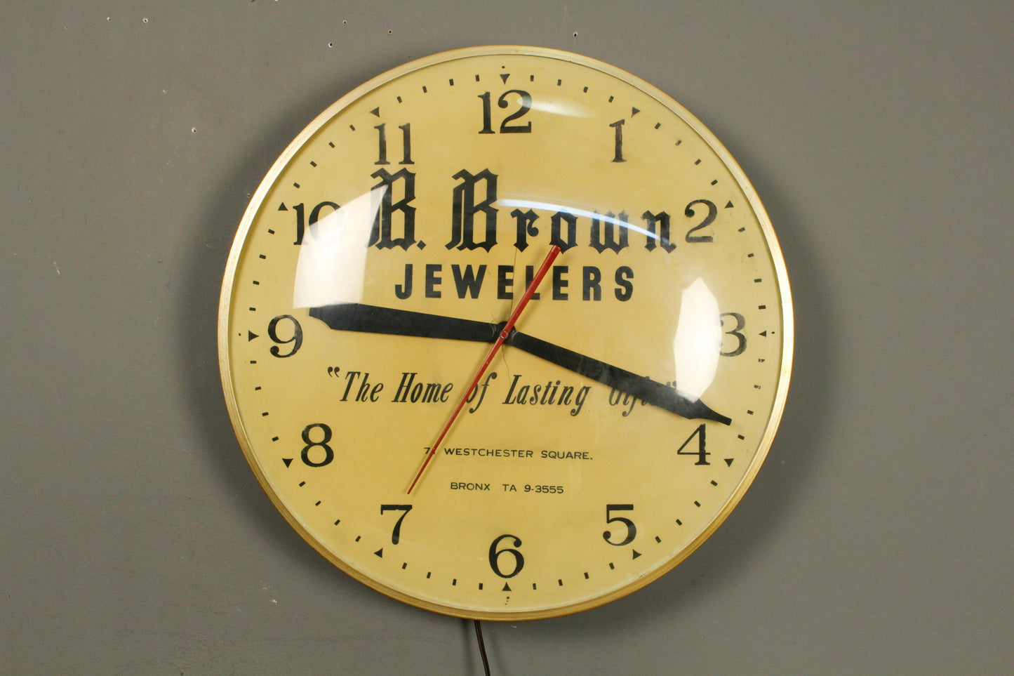 B. Brown Jewelers Illuminated Wall Clock