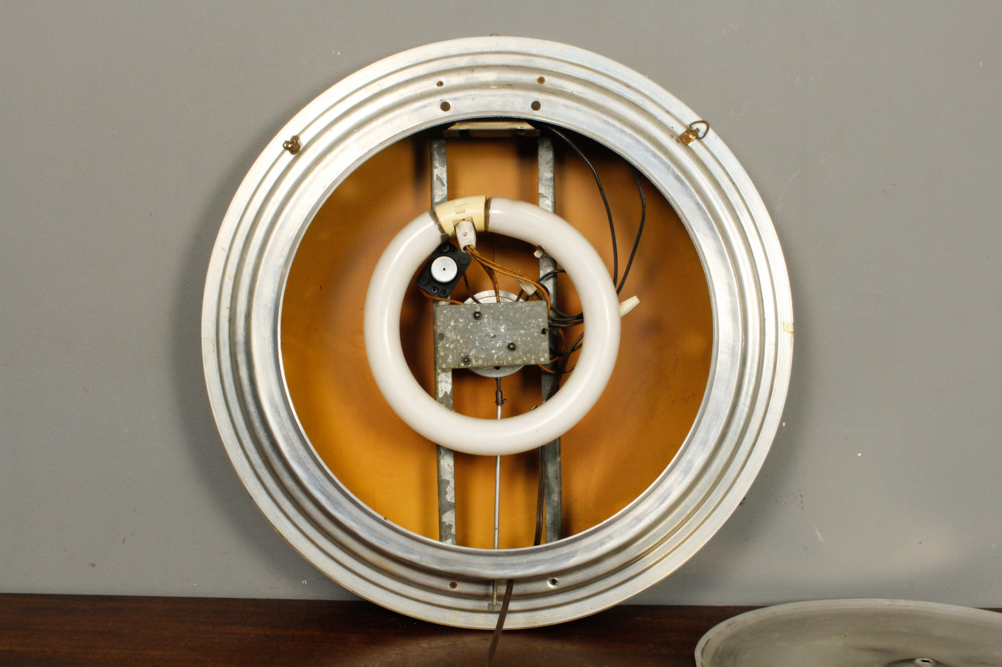 B. Brown Jewelers Illuminated Wall Clock