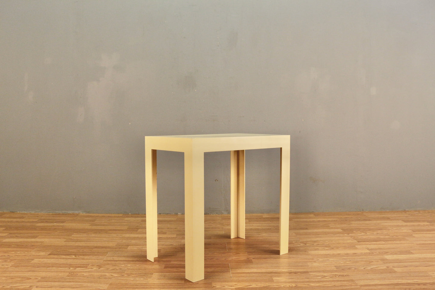 Cream Plastic Parsons-Style Table
