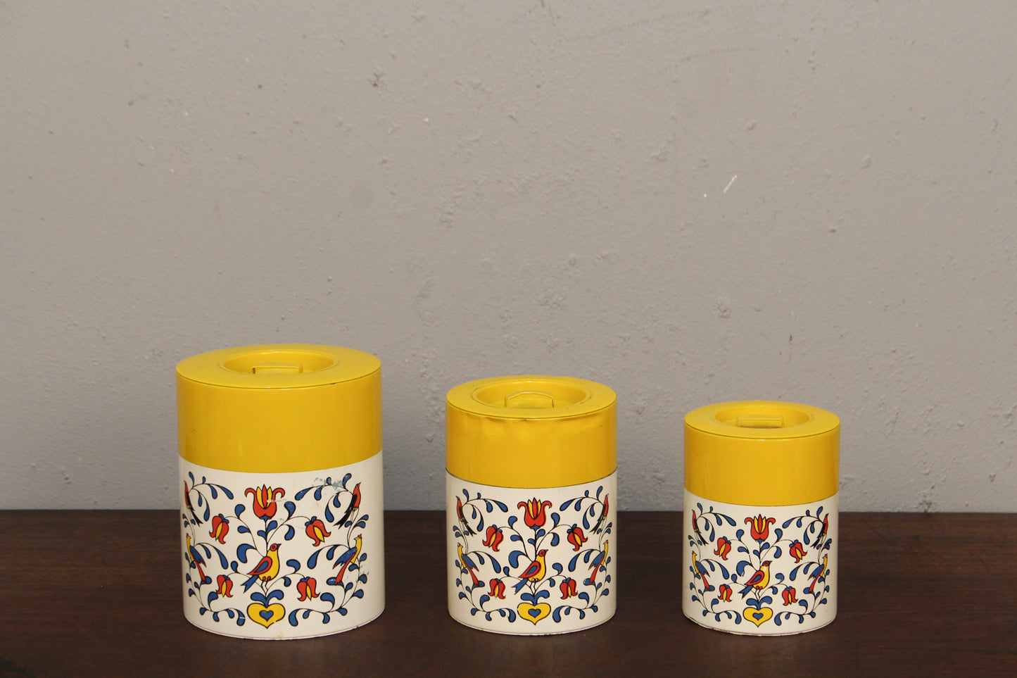 Trio of Yellow Floral Tin Canisters