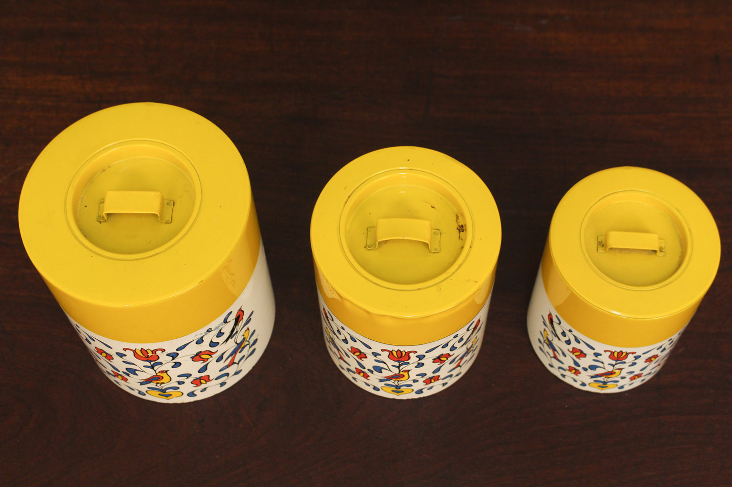 Trio of Yellow Floral Tin Canisters