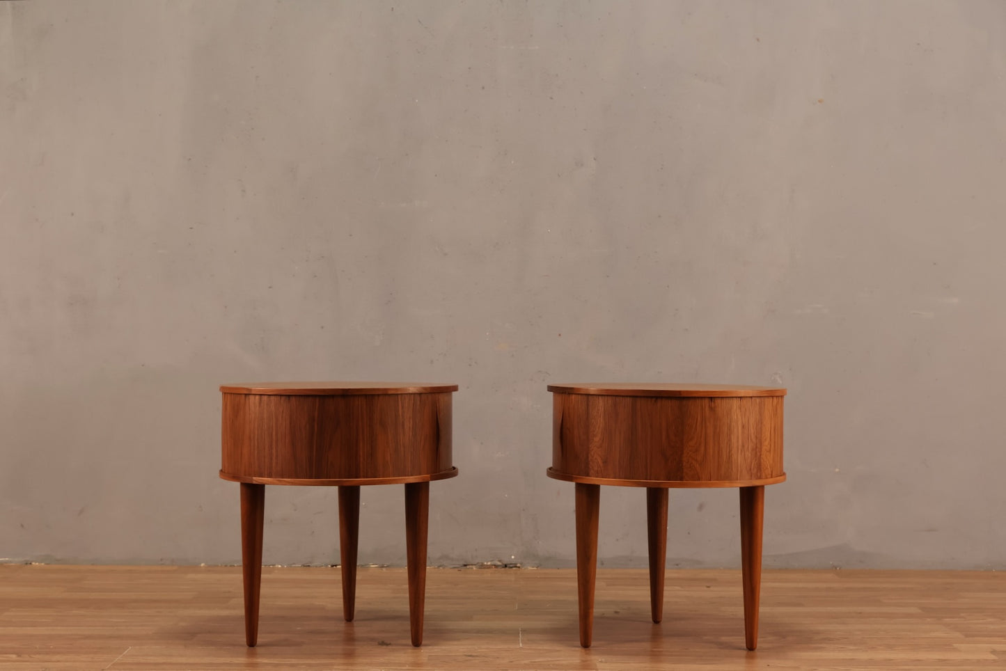 Pair of Petite Umbra "Rolly" Round Side Tables